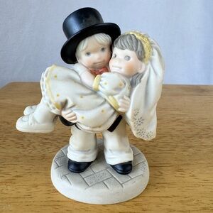 Enesco Figurine Collectible “We’ve Only Just Begun”.  Bride and Groom.